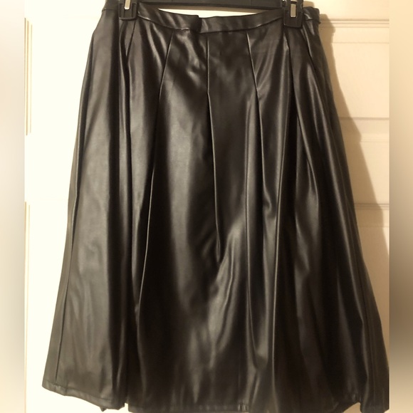 Black faux leather skirt; nice and soft with side zipper; hook and eye closure - Picture 1 of 7